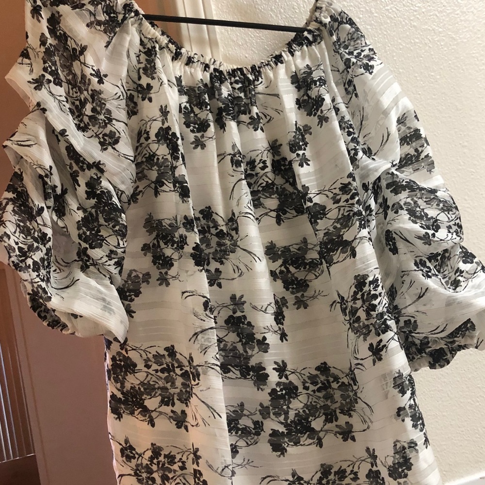 Black and white flowered top off the shoulder